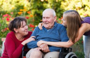 The female generation visiting old grandfather at the nursing home