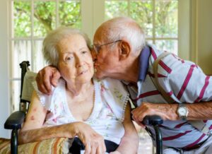 Senior man kissing his wife