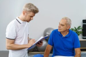 Professional discussing digital care management with a client