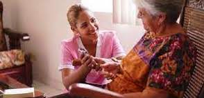 Care taker looking after a resident