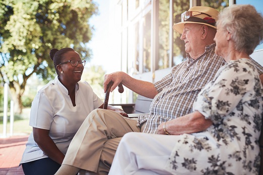 Portrait of senior couple relaxing on a bench