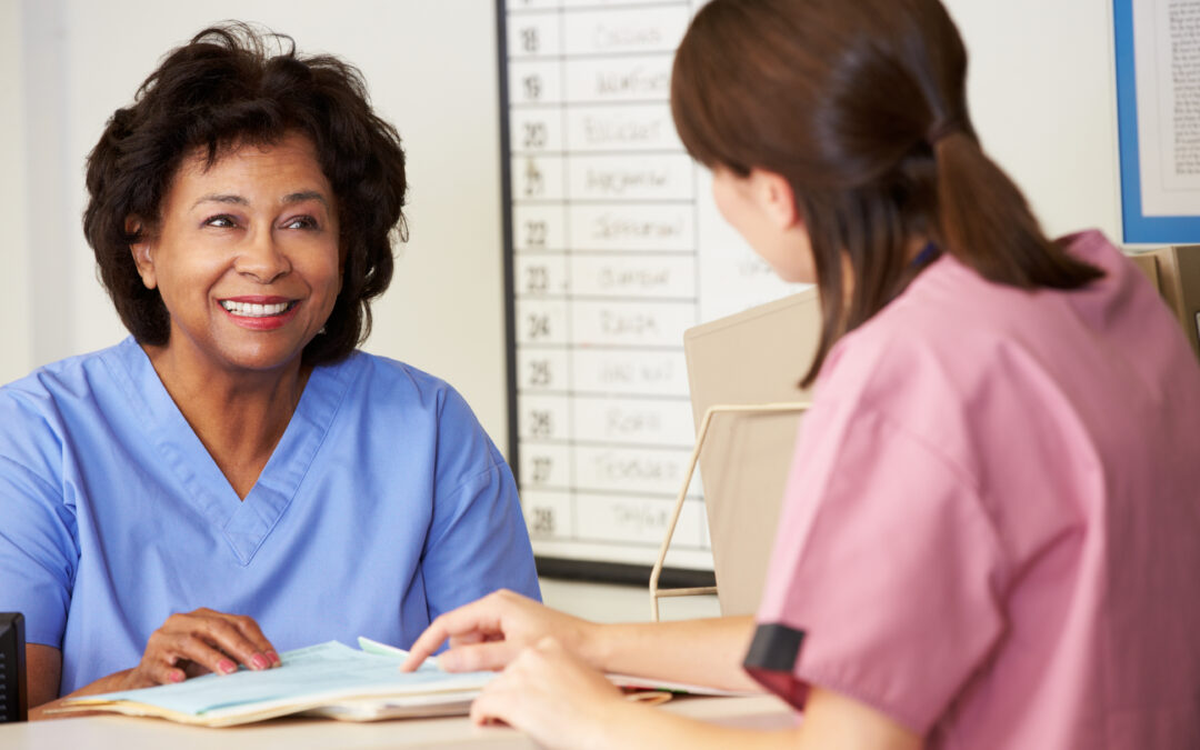 Two nurses in discussion